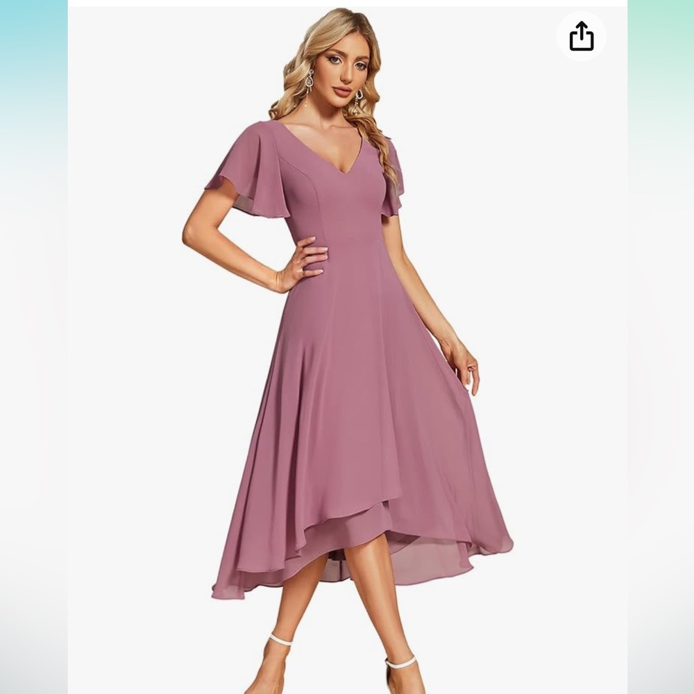 Woman’s V neck, ruffle sleeve. NWT. Wedding guest dress. Size 14